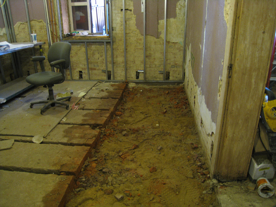 Ground Floor--Floor removal for plumbing, southeast corner room