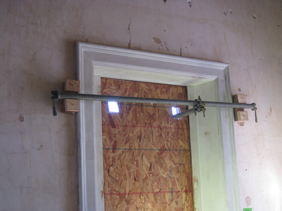 Second Floor--Innovative technique for stabilizing scaffolding, in northeast corner room