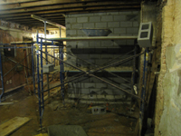 Ground Floor (Basement) - elevator enclosure inside northwest room.