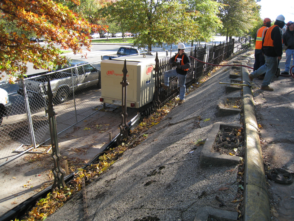Fence--Removing fence section from Pennsylvania Ave. side for restoration