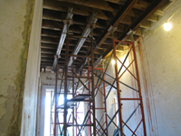 First Floor--Main corridor to south with shoring for removal of walls on second floor - October 29, 2010