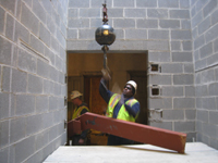 Miscellaneous--Stair elements being lifted into building through the elevator shaft on the second floor - November 1, 2010