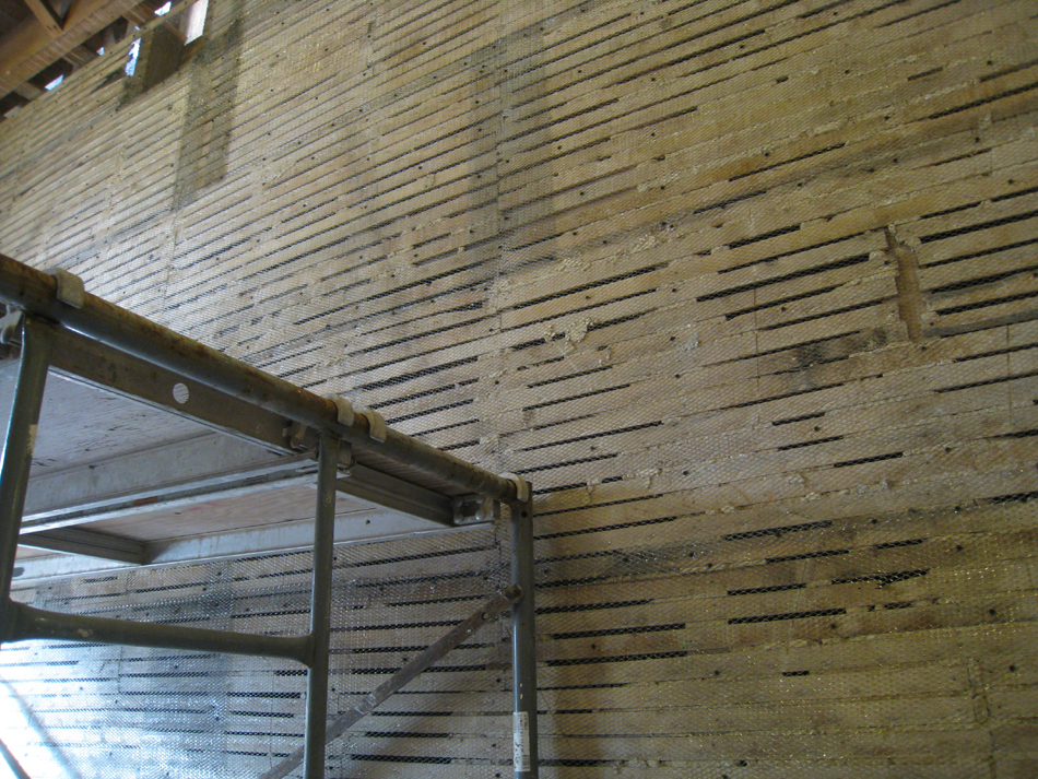 Second Floor--Southeast room--West wall.  Lathing bared for replacement of plaster (see 5570)
