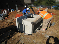 Geothermal/HVAC--Lowering vault sections into place - November 8, 2010