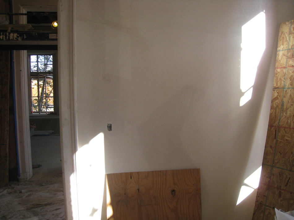 First Floor--Final skim coat for plaster in south east corner (north side)