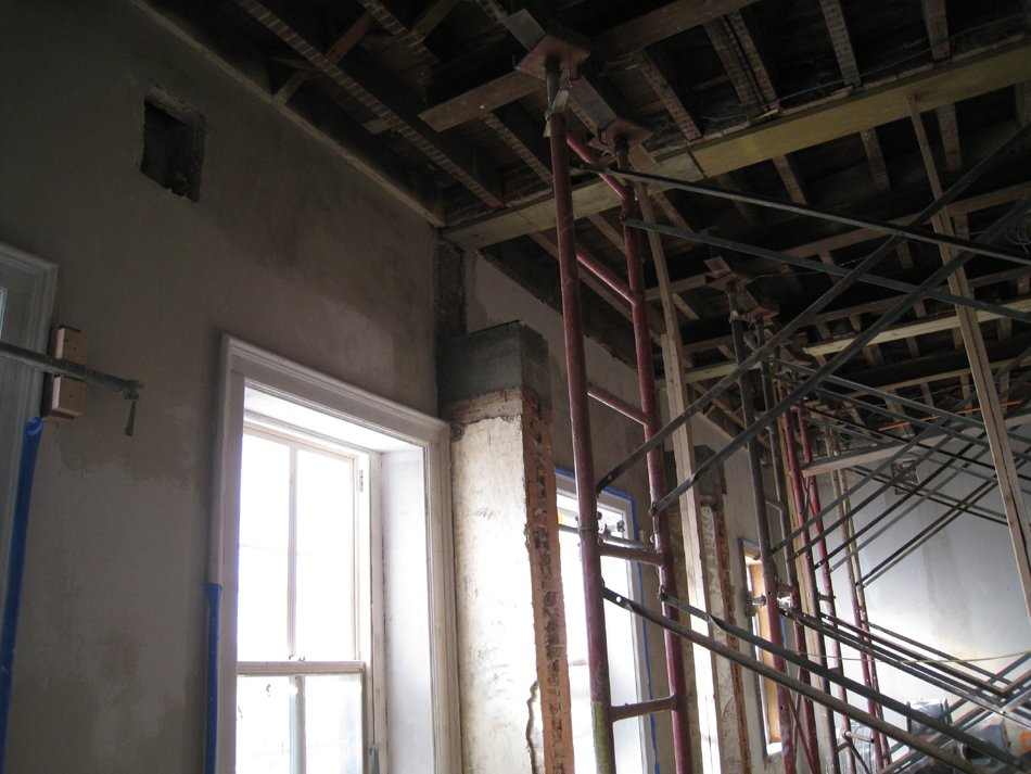 Second Floor--Central (large) room showing brown plaster and column preparation - December 28, 2010