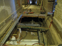 Ground Floor (Basement) --Under floor chase in east side corridor - January 20, 2011