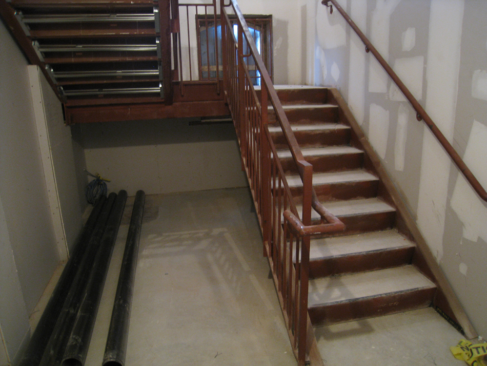 Ground Floor--West stairs with concrete poured - February 18, 2011