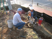 Fence--Drilling anchor holes in existing fence foundation for installation - March 18, 2011