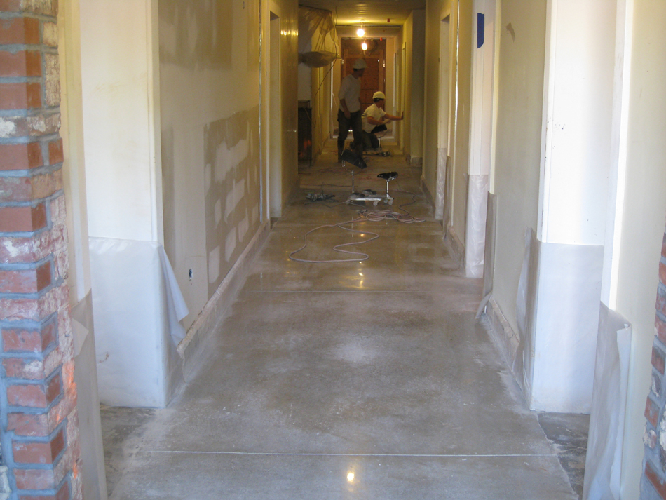 Ground Floor--Workers polishing the concrete corridor floor - April 29, 2011