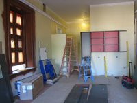 First Floor--Beginning installation of cases, north west corner room - May 11, 2011