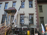 Elevation--North portico ironwork being installed - June 2, 2011