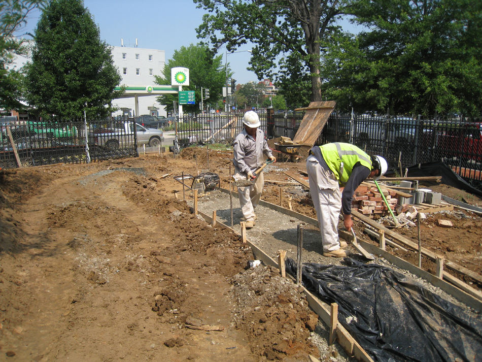 Grounds--Preparing for pouring concrete for sidewalk (north west corner) - June 10, 2011